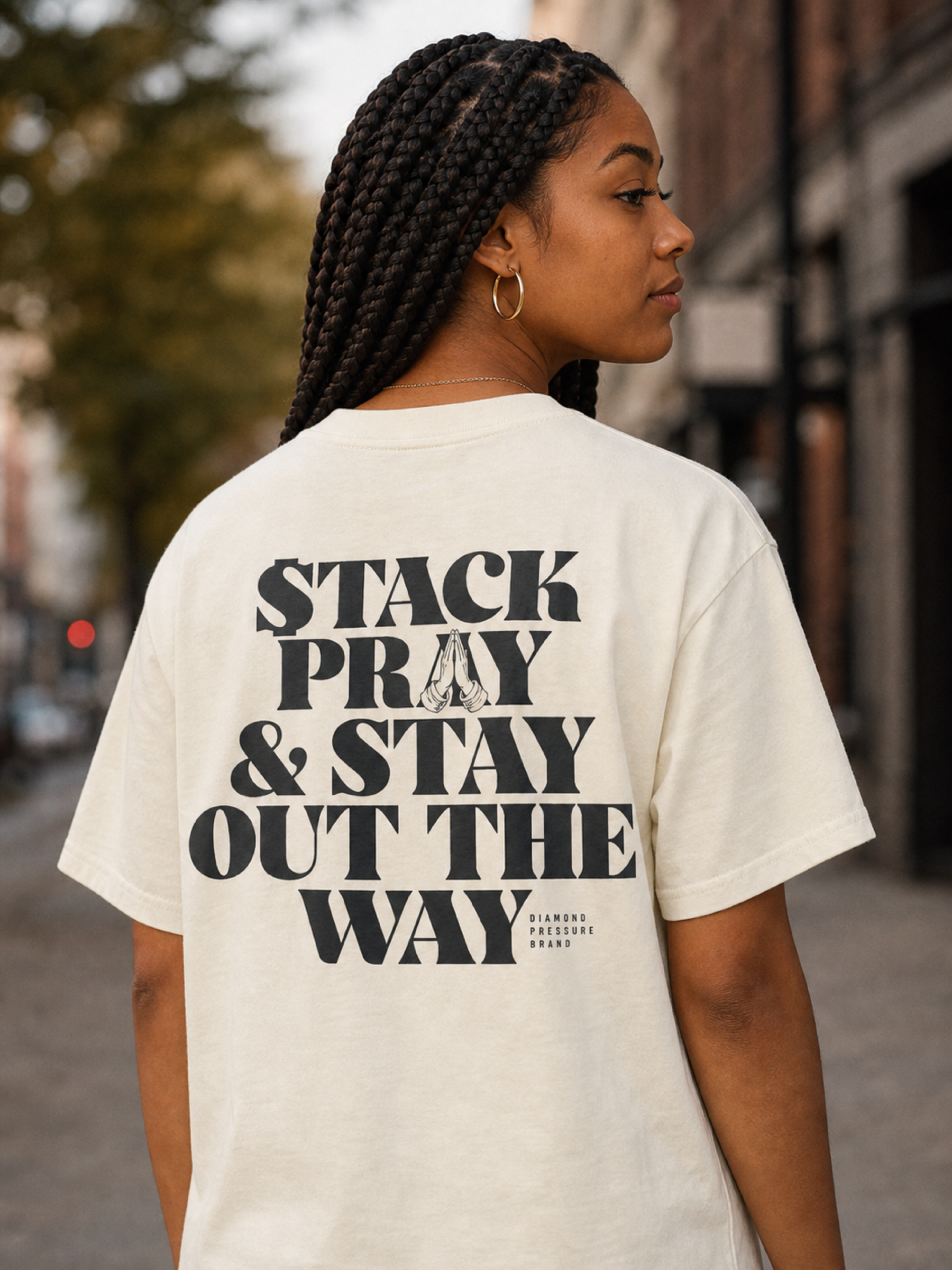 Pray Tee in Faded Cream back editorial lifestyle photo