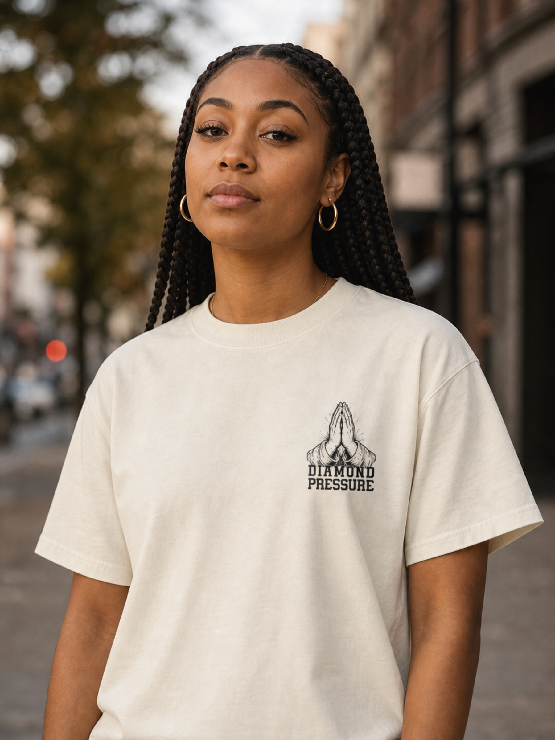 Pray Tee in Faded Cream front editorial lifestyle photo